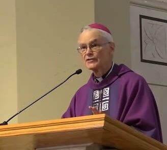 Bishop Kelly preaching donate page